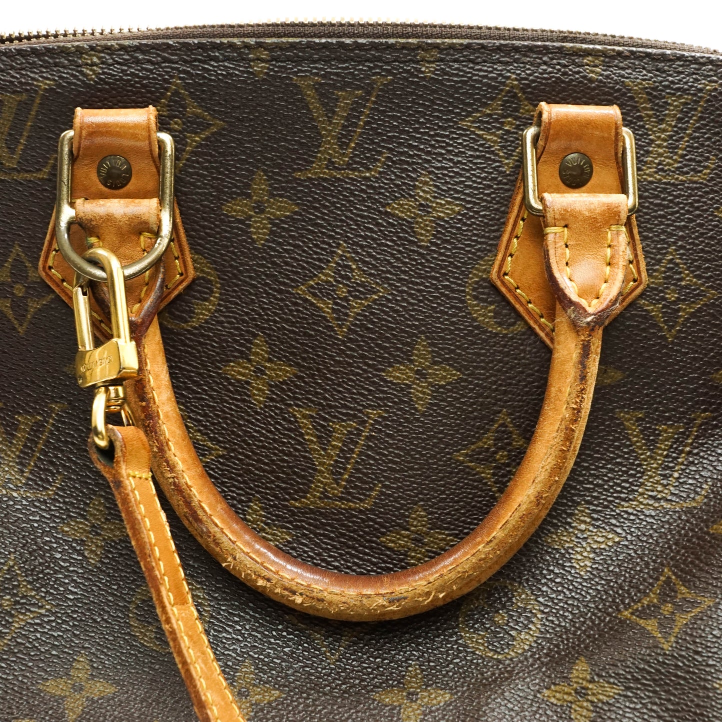 Louis Vuitton Alma Handbag
