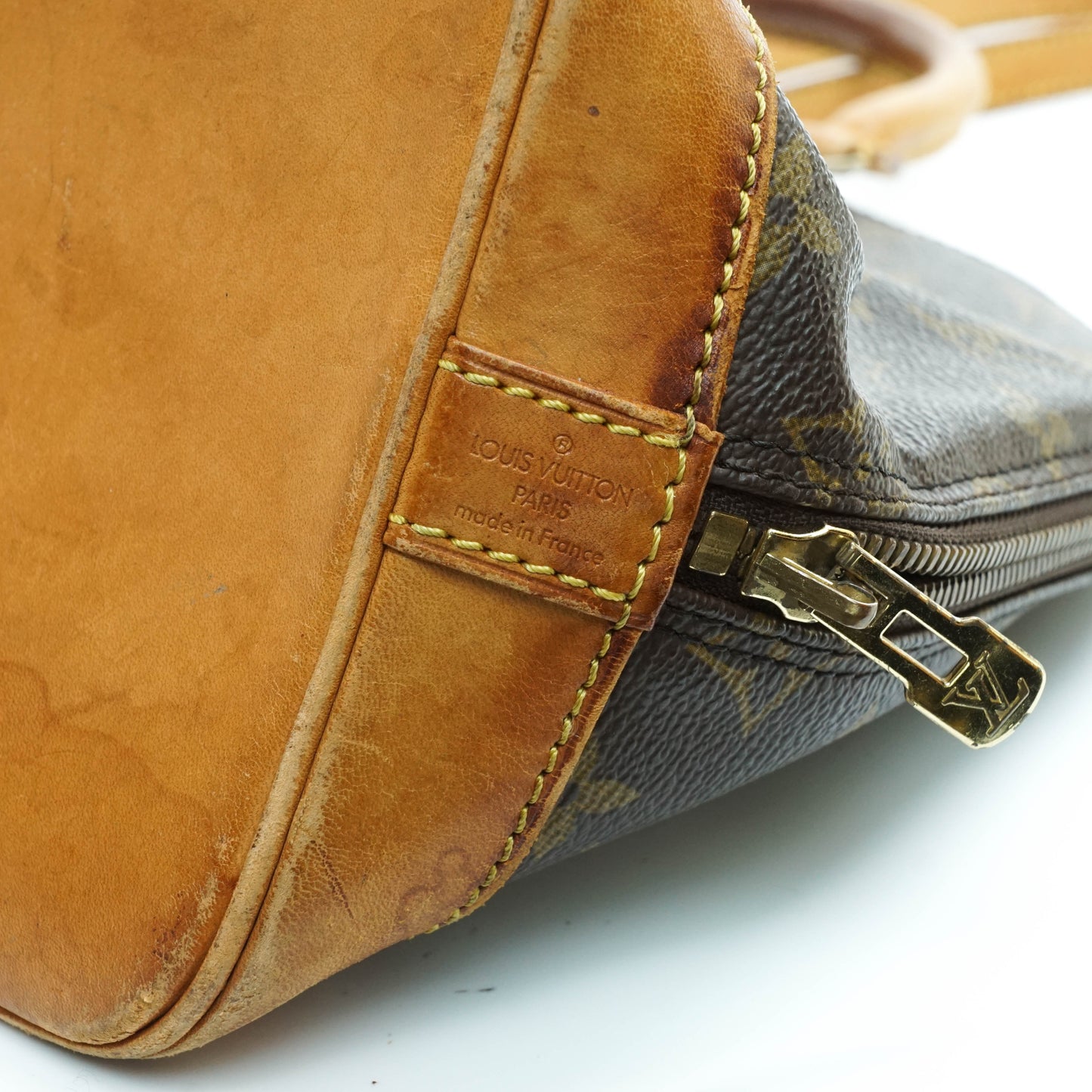 Louis Vuitton Alma Handbag
